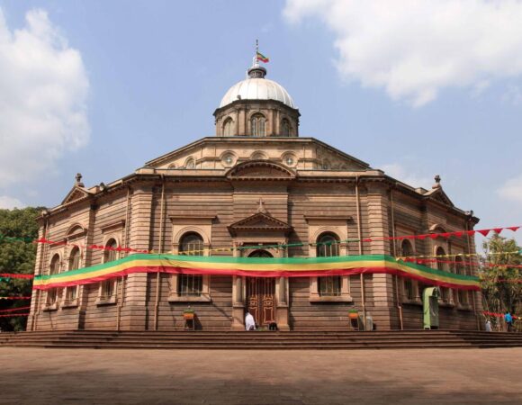 Historic stone architecture and stained glass of Saint George Cathedral in Addis Ababa