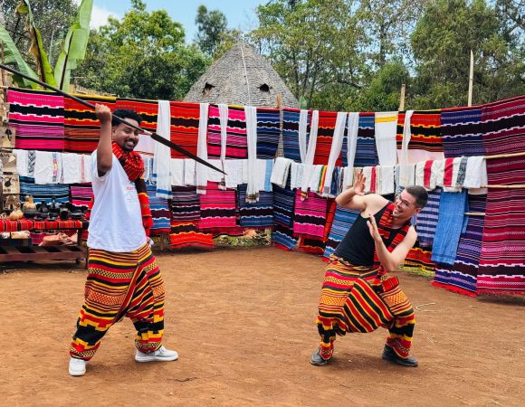 Dorze village community dancers celebrating during a private cultural performance in southern Ethiopia