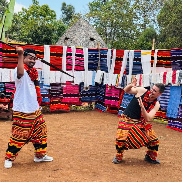 Dorze village community dancers celebrating during a private cultural performance in southern Ethiopia