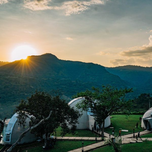 Sunset over the hills and lodge at Chebera Churchura