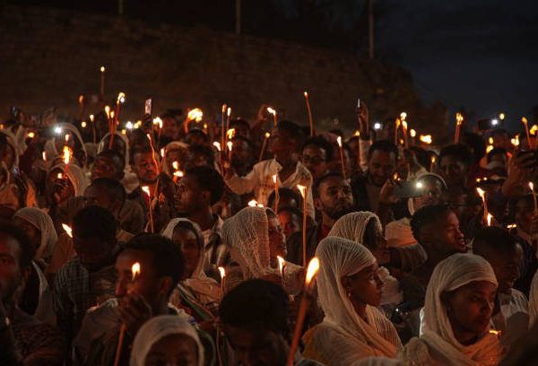 Crowds holding candles at the Meskel celebration